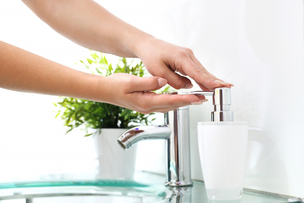 person washing their hands