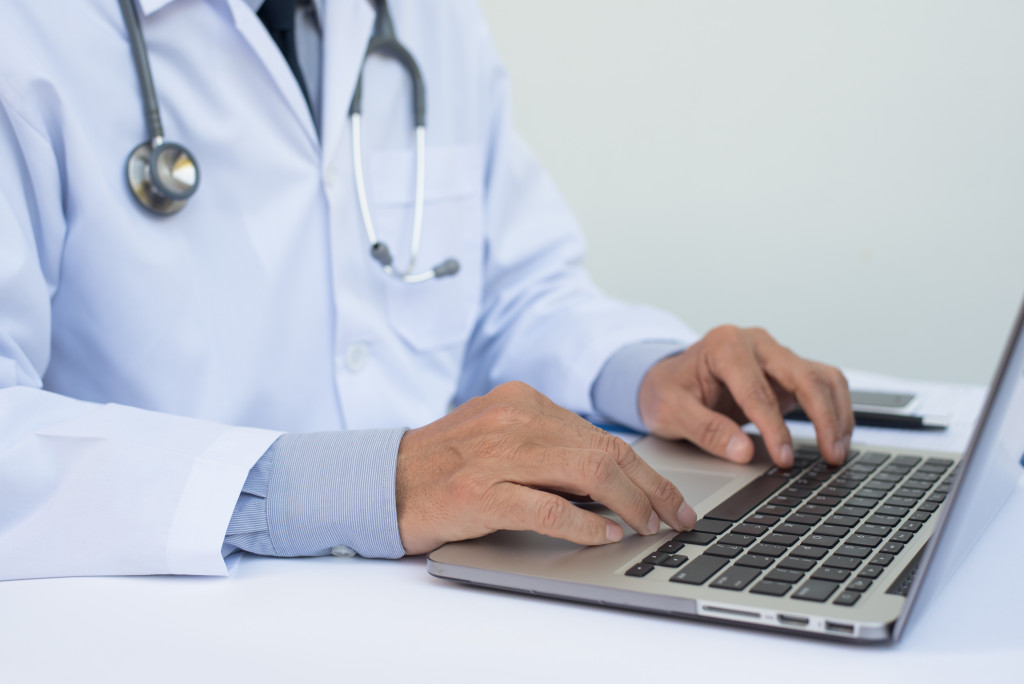 doctor using laptop