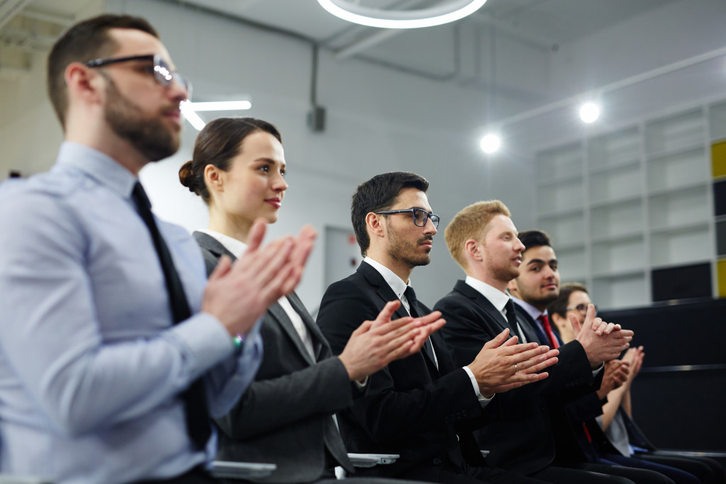 clapping audience standing