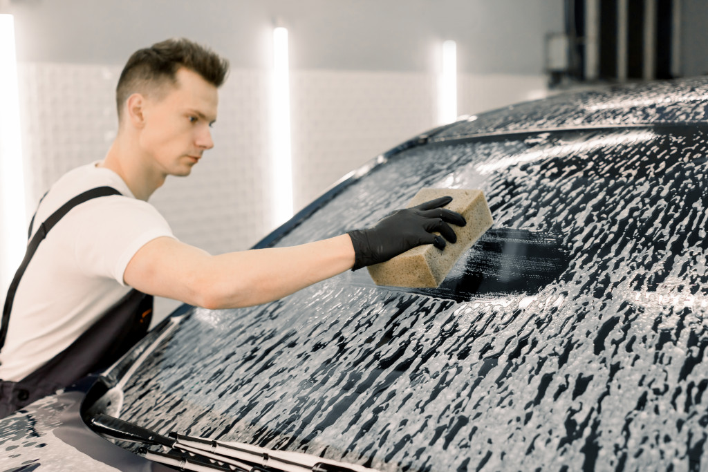 A man is washing car