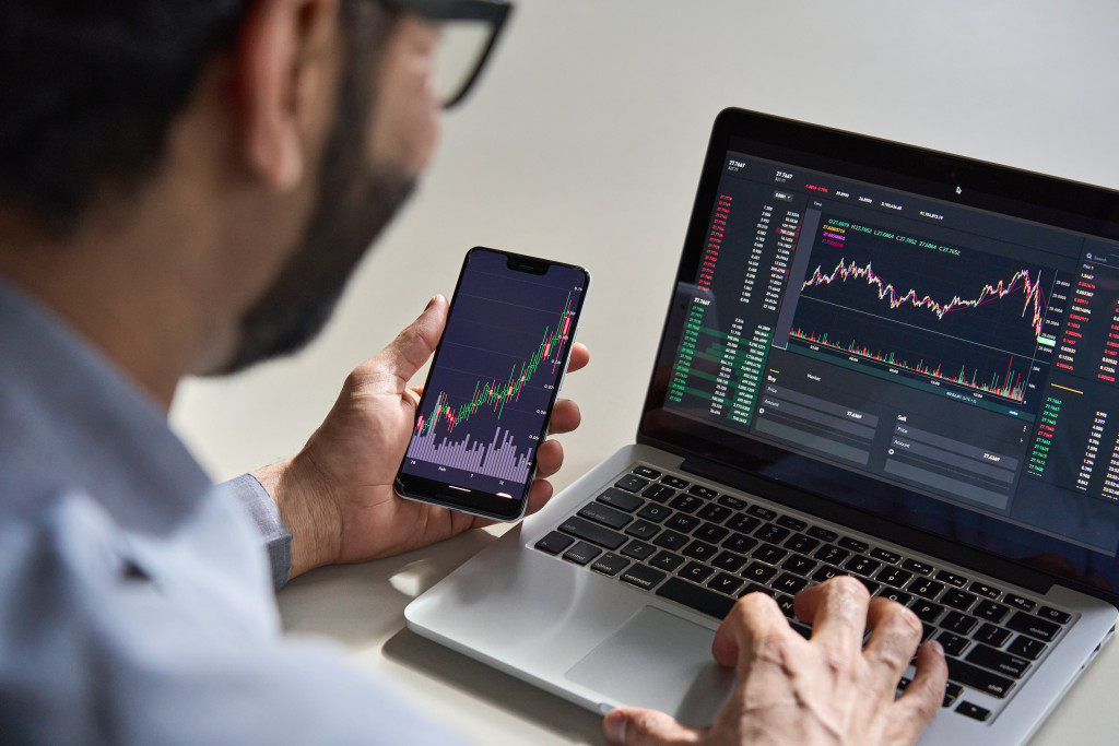 a businessman looking at data graphs for analytics