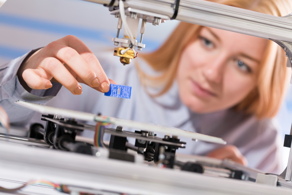 A 3D printer being used