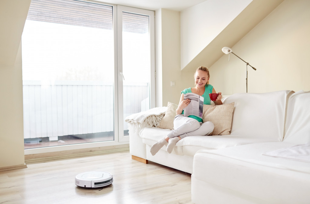 A robot vacuum doing the cleaning chore