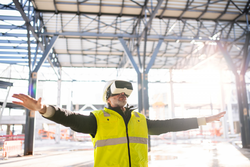 engineer using VR to check construction site