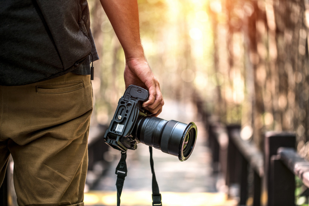 photographer with DSLR